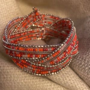 Orange and silver memory wire beaded bracelet
